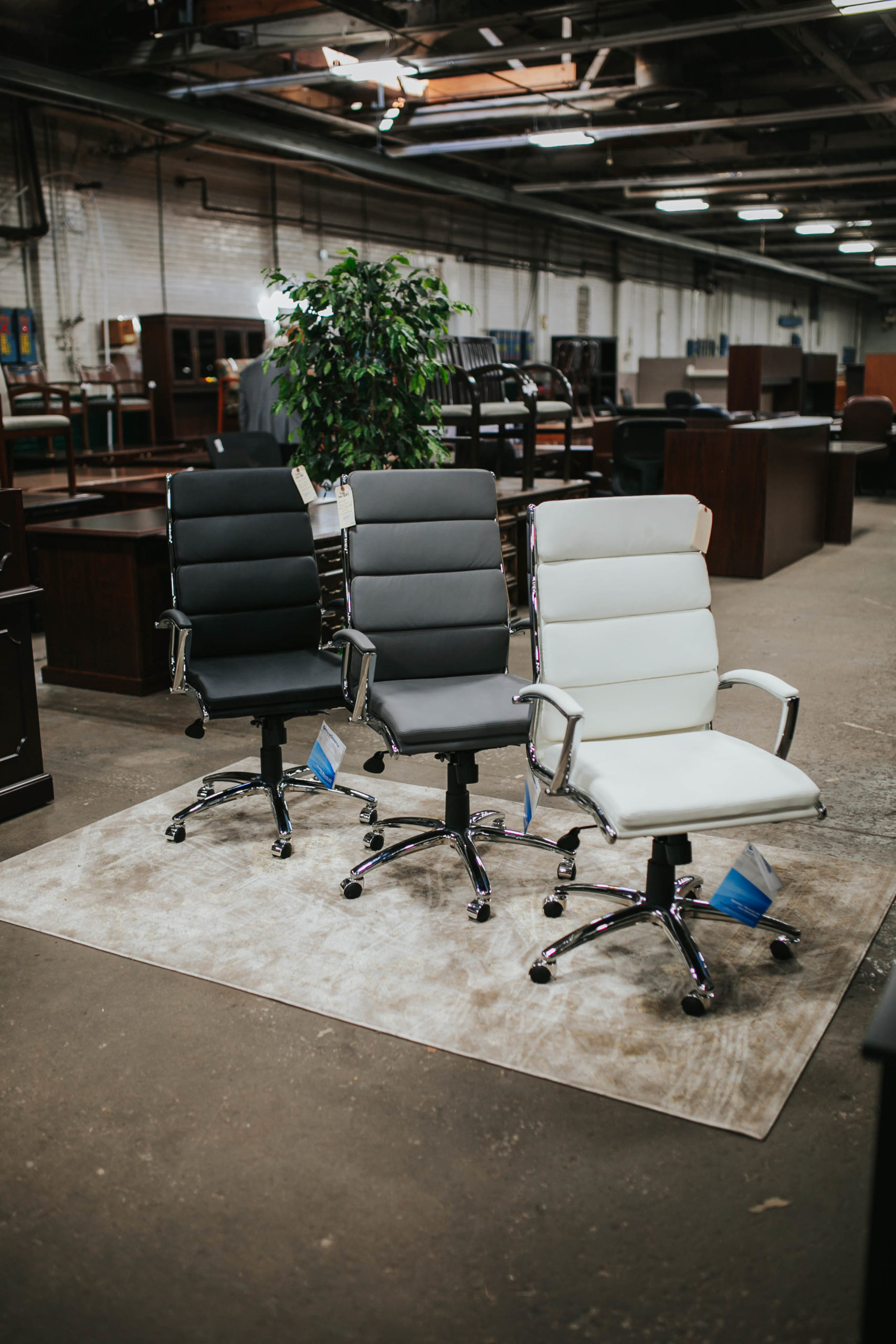 Brooks Furniture black, gray, and white chairs